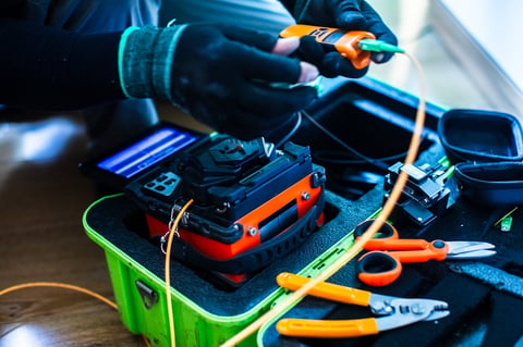 Selective focus to fiber optic splicing cable tools. Fixing Internet Cable